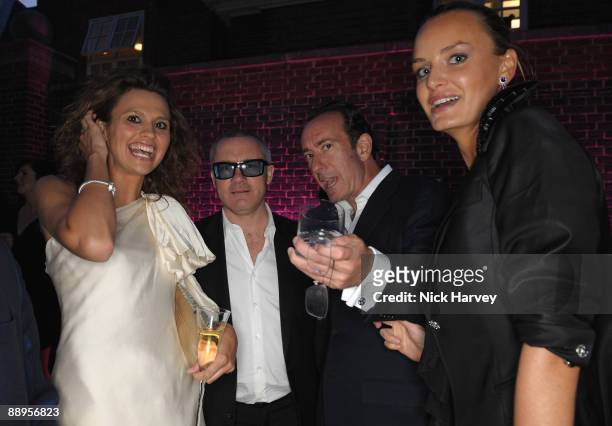 Olivia Cole, artist Damien Hirst, Robert Hanson and Masha Markova attends the annual Summer Party at the Serpentine Gallery on July 9, 2009 in...