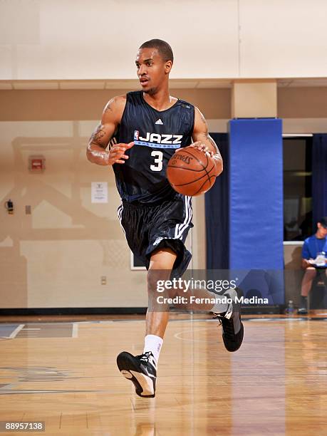 Eric Maynor of the Utah Jazz dribbles against the Orlando Magic during the 2009 Orlando Pro Summer League on July 9, 2009 at the RDV Sportsplex in...