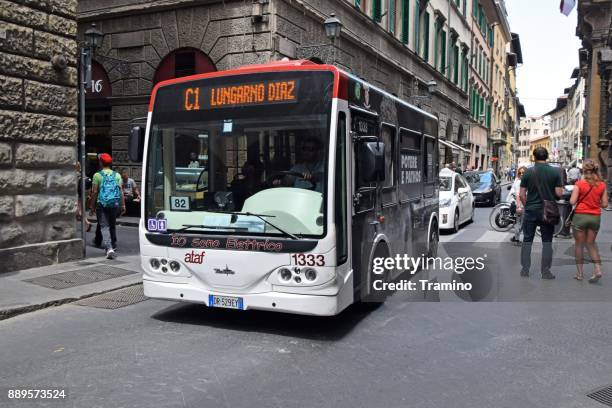 electric bus in motion on the street - fleet white vans stock pictures, royalty-free photos & images