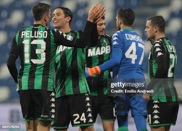 Edoardo Goldaniga of US Sassuolo Calcio celebrates with his team-mate Federico Peluso the victory at the end of the Serie A match between US Sassuolo...