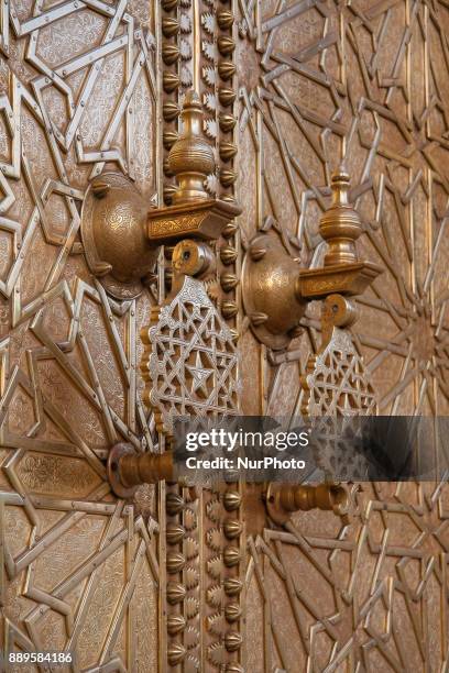 The entrance with the golden gates in the old Royal Palace in Fez, Morocco