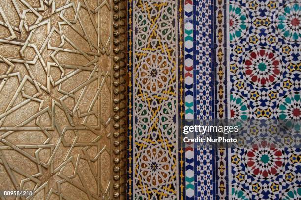 The entrance with the golden gates in the old Royal Palace in Fez, Morocco