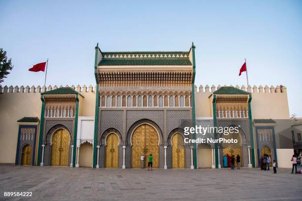 The entrance with the golden gates in the old Royal Palace in Fez, Morocco