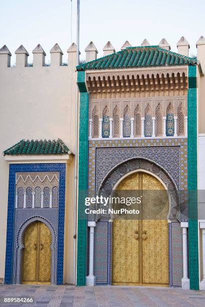 The entrance with the golden gates in the old Royal Palace in Fez, Morocco