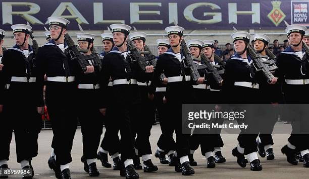 Royal Navy recruits march during their passing out parade at the training establishment HMS Raleigh on the final day of their initial nine-week basic...