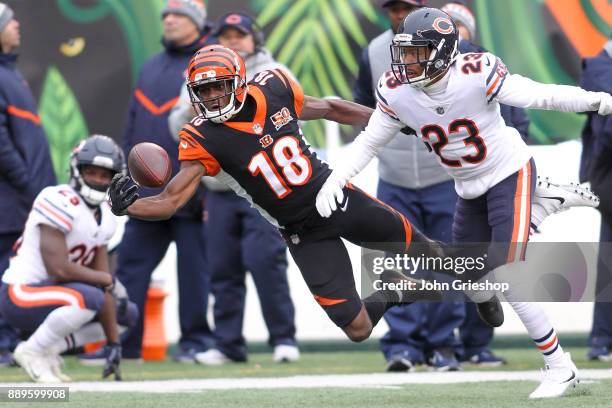 Green of the Cincinnati Bengals dives for a pass defended by Kyle Fuller of the Chicago Bears during the first half at Paul Brown Stadium on December...