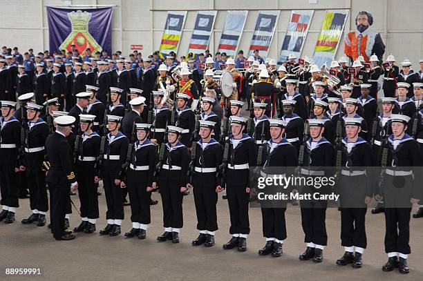 Royal Navy recruits are inspected during their passing out parade at the training establishment HMS Raleigh on the final day of their initial...