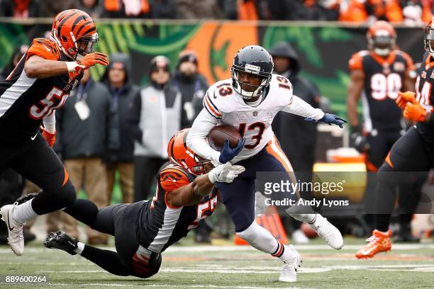 Kendall Wright of the Chicago Bears breaks a tackle from Vincent Rey of the Cincinnati Bengals during the first half at Paul Brown Stadium on...