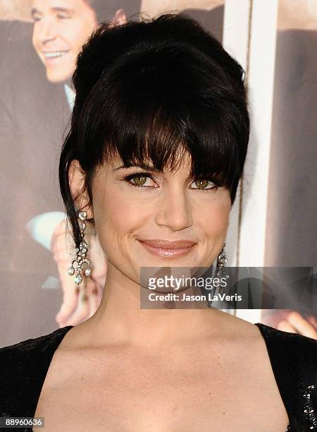 Actress Carla Gugino attends the sixth season premiere of HBO's "Entourage" at Paramount Studios on July 9, 2009 in Los Angeles, California.