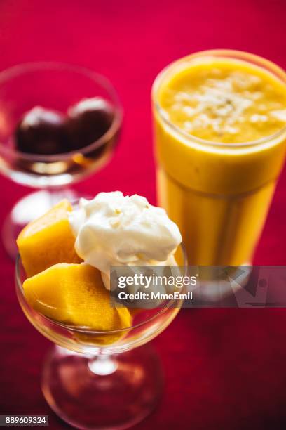 gulab jamun, mango kulfi and lassi. north indian food and desserts - gulab jamun stock pictures, royalty-free photos & images