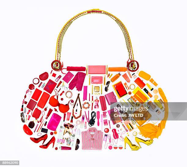 women's belongings in shape of handbag - bolso naranja fotografías e imágenes de stock