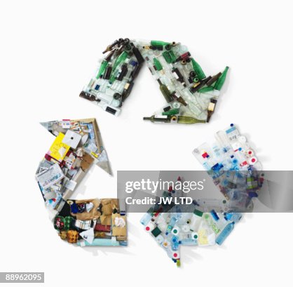 Recycling materials in shape of recycling symbol Recycling materials in shape of recycling symbol