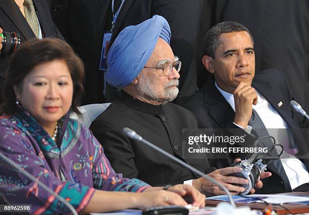 Indian Prime Minister Manmohan Singh and US President Barack Obama attend a meeting of the Group of Eight and participating African countries at the...