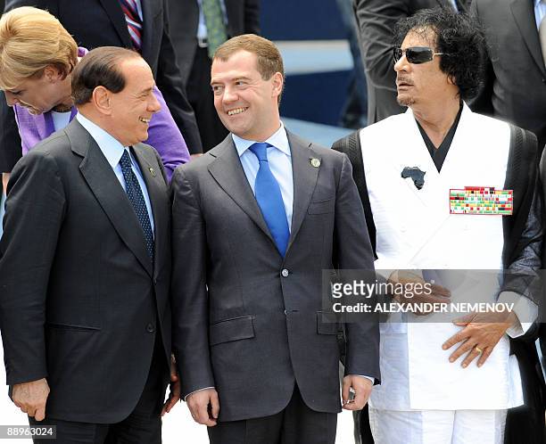 Italian Prime Minister Silvio Berlusconi, Russian President Dmitri Medvedev and Libyan Leader Moamer Kadhafi are pictured during an unveiling of a...