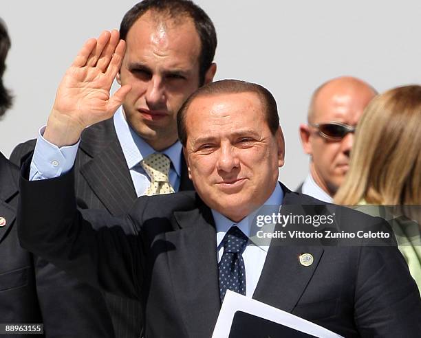 Italian Prime Minister Silvio Berlusconi arrives for a meeting of the G8 Summit at the Guardia Di Finanza School of Coppito on July 10, 2009 in...