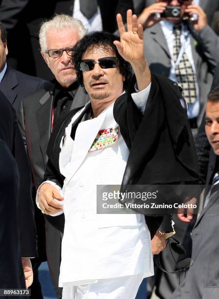 Libyan leader Moamer Kadhafi arrives for a meeting of the G8 Summit at the Guardia Di Finanza School of Coppito on July 10, 2009 in L'Aquila, Italy....