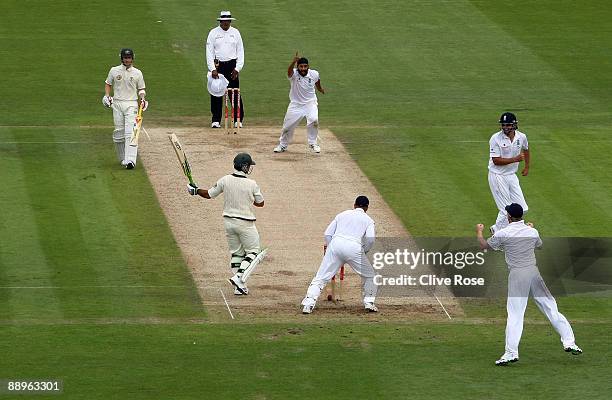 Monty Panesar of England celebrates the wicket of Ricky Ponting of Australia during day three of the npower 1st Ashes Test Match between England and...