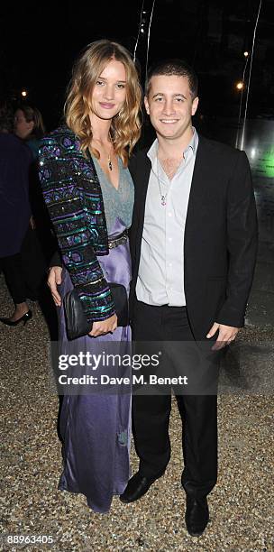 Rosie Huntington-Whiteley and Tyrone Wood attend the Serpentine Gallery Summer Party, at The Serpentine Gallery on July 9, 2009 in London, England.