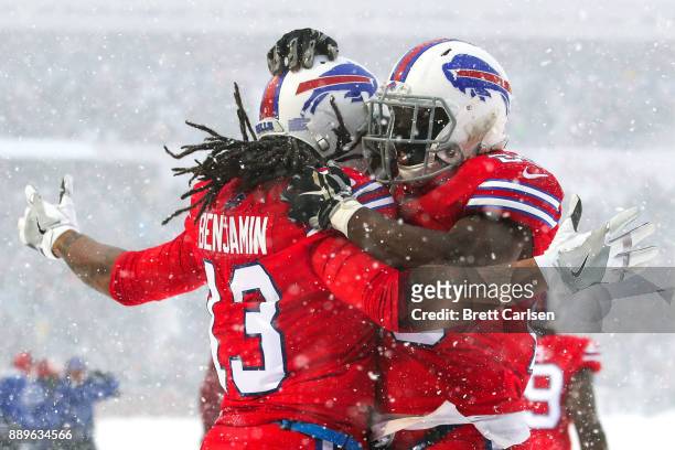 Kelvin Benjamin of the Buffalo Bills celebrates with LeSean McCoy of the Buffalo Bills after scoring a touchdown during the second quarter against...