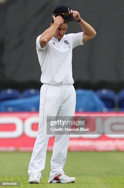 Andrew Strauss of England wipes his brow during day three of the npower 1st Ashes Test Match between England and Australia at the SWALEC Stadium on...