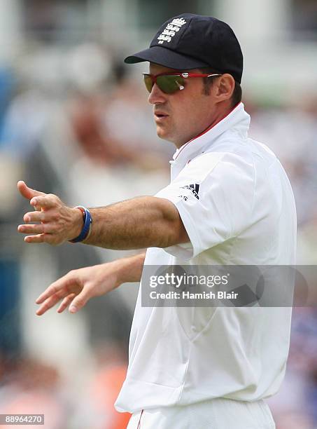 Andrew Strauss of England moves his field during day three of the npower 1st Ashes Test Match between England and Australia at the SWALEC Stadium on...