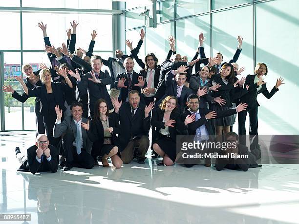 group of officemates doing a theatrical pose - organised group photo stock pictures, royalty-free photos & images
