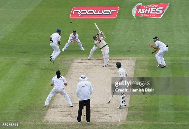 Michael Clarke of Australia hits a six off the bowling of Monty Panesar of England during day three of the npower 1st Ashes Test Match between...