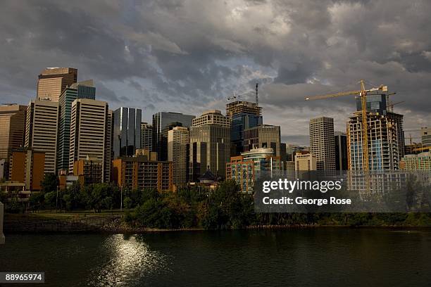 The bustling downtown skyline and Bow River is seen in this 2009 Calgary, Canada, early morning city landscape photo.