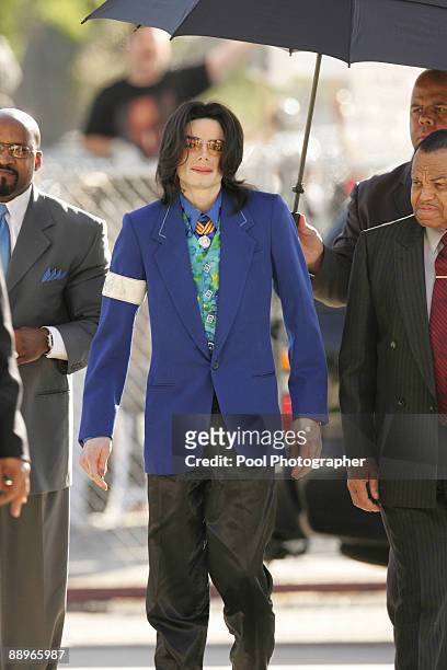 Pop star Michael Jackson arrives at Santa Barbara County Courthouse in Santa Maria, California for another day of testimony in his child molestation...