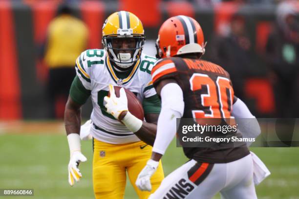 Geronimo Allison of the Green Bay Packers runs the ball against Jason McCourty of the Cleveland Browns in the second half at FirstEnergy Stadium on...