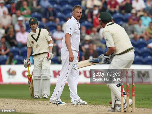 Andrew Flintoff of England exchanges words with Marcus North of Australia during day three of the npower 1st Ashes Test Match between England and...
