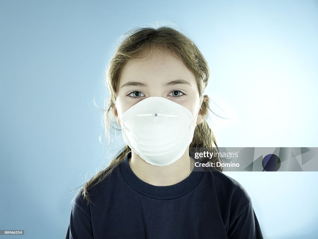 Portrait of a girl wearing a face mask