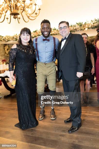 Susan and Jeff Shapiro and Runner Patrick "Blake" Leeper attend The Thalians: Hollywood for Mental Health Holiday Party 2017 at the Bel Air Country...