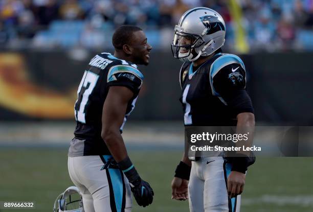 Cam Newton and teammate Devin Funchess of the Carolina Panthers react against the Minnesota Vikings in the third quarter during their game at Bank of...