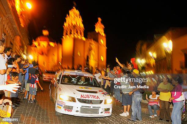 More than 30,000 people gathered to see Manfred Stohl and Ilka Minor of Austria, and other competitors, at the start of the Rally of Nations Mexico...