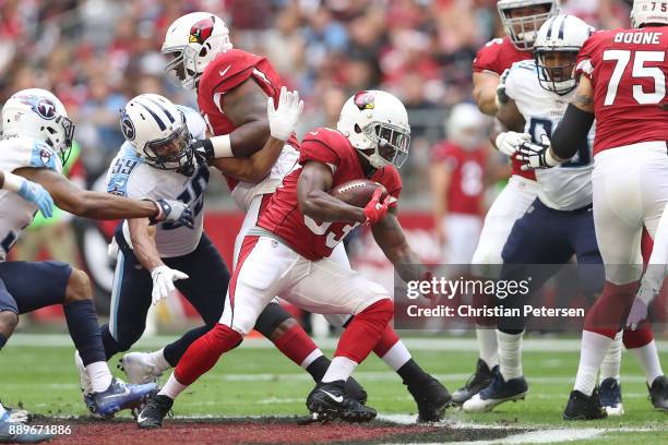 Kerwynn Williams of the Arizona Cardinals carries in the first half against the Tennessee Titans at University of Phoenix Stadium on December 10,...