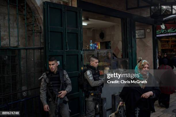 Israeli Police officers stand guard in the Muslim quarter of the Old City on December 10, 2017 in Jerusalem, Israel. In an already divided city, U.S....