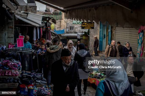 People shop in the Muslim Quarter of the Old City on December 10, 2017 in Jerusalem, Israel. In an already divided city, U.S. President Donald Trump...