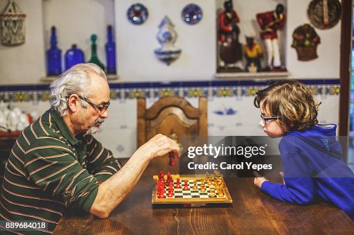 Playing chess with grandpa Playing chess with grandpa