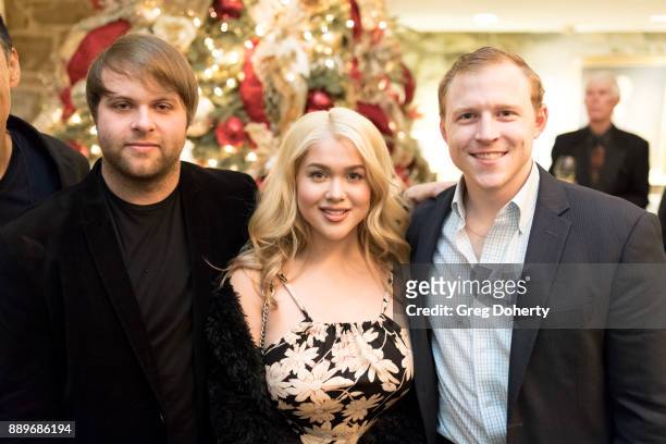 Michael Grizzard, Tory Ross, and Joshua Erp attend The Thalians: Hollywood for Mental Health Holiday Party 2017 at the Bel Air Country Club on...