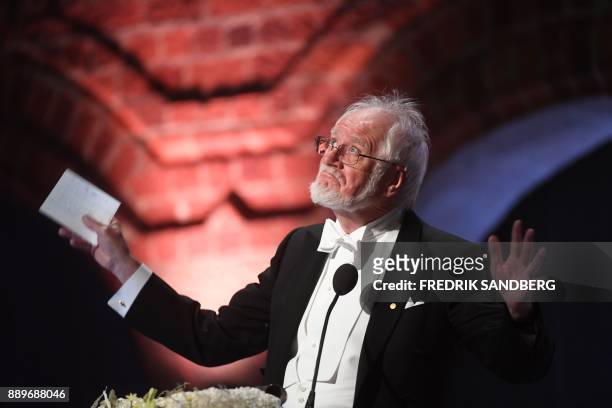 Swiss biophysicist and Nobel Prize in Chemistry 2017 laureate, Jacques Dubochet, gestures as he delivers his Banquet Speech at the 2017 Nobel Prize...