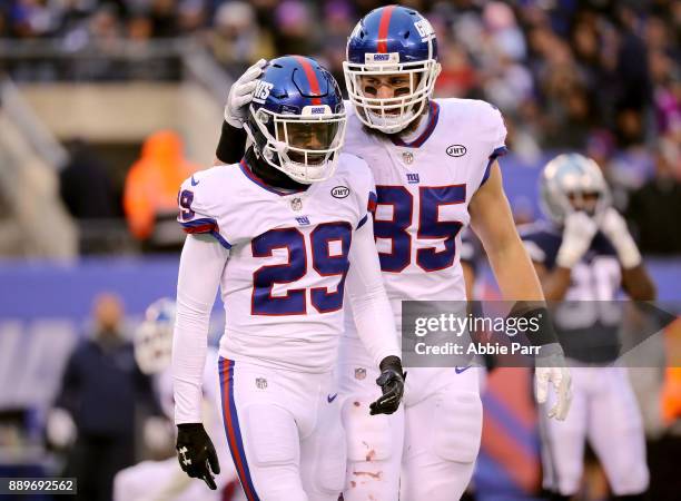 Nat Berhe and Rhett Ellison of the New York Giants react in the second half during their game at MetLife Stadium on December 10, 2017 in East...