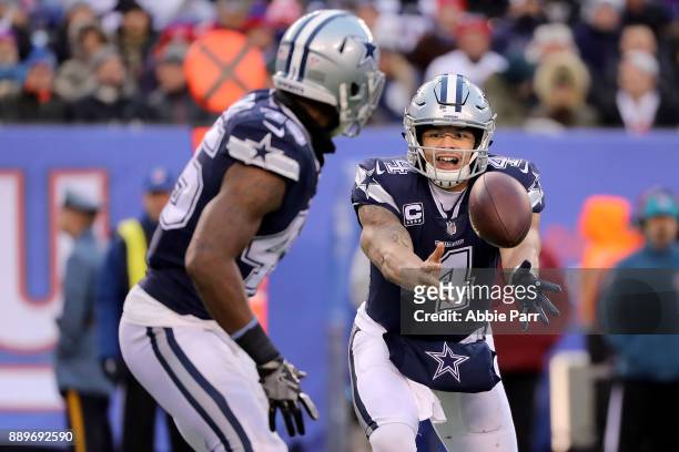 Dak Prescott pitches the ball to Rod Smith of the Dallas Cowboys in the second half during their game at MetLife Stadium on December 10, 2017 in East...