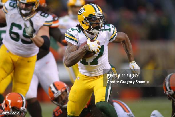 Davante Adams of the Green Bay Packers scores the game-winning touchdown in overtime of a 27-21 victory over the Cleveland Browns at FirstEnergy...