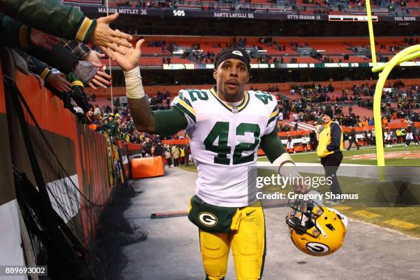 Morgan Burnett of the Green Bay Packers celebrates 27-21 victory over the Cleveland Browns with fans at FirstEnergy Stadium on December 10, 2017 in...