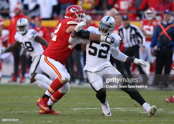 Kansas City Chiefs offensive tackle Eric Fisher blocks Oakland Raiders defensive end Khalil Mack in the fourth quarter of an AFC West showdown...