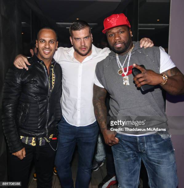 Mani, Ryan and 50 Cent arrive at Ora Nightclub on December 9, 2017 in Miami Beach, Florida.