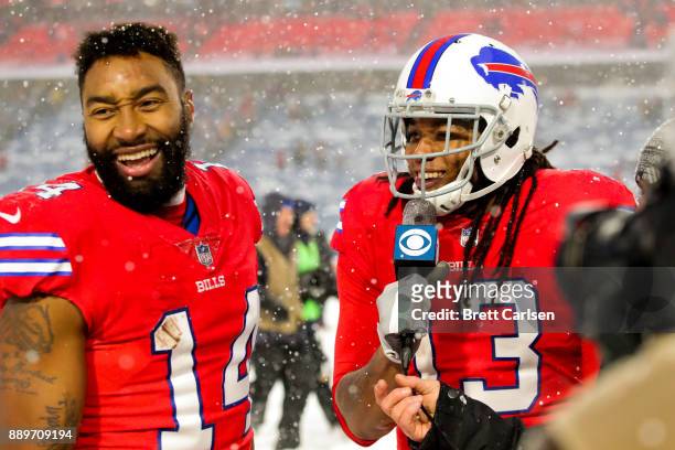 Kelvin Benjamin of the Buffalo Bills fake interviews Joe Webb of the Buffalo Bills after a game against the Indianapolis Colts on December 10, 2017...