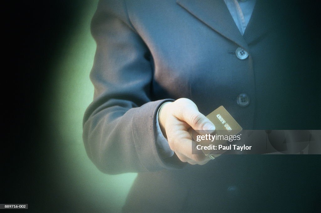 Woman holding credit card