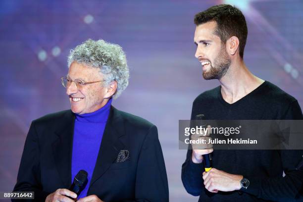 Nelson Montfort and Nathan Paulin are pictured on stage during the 31st France Television Telethon at Pavillon Baltard on December 9, 2017 in...